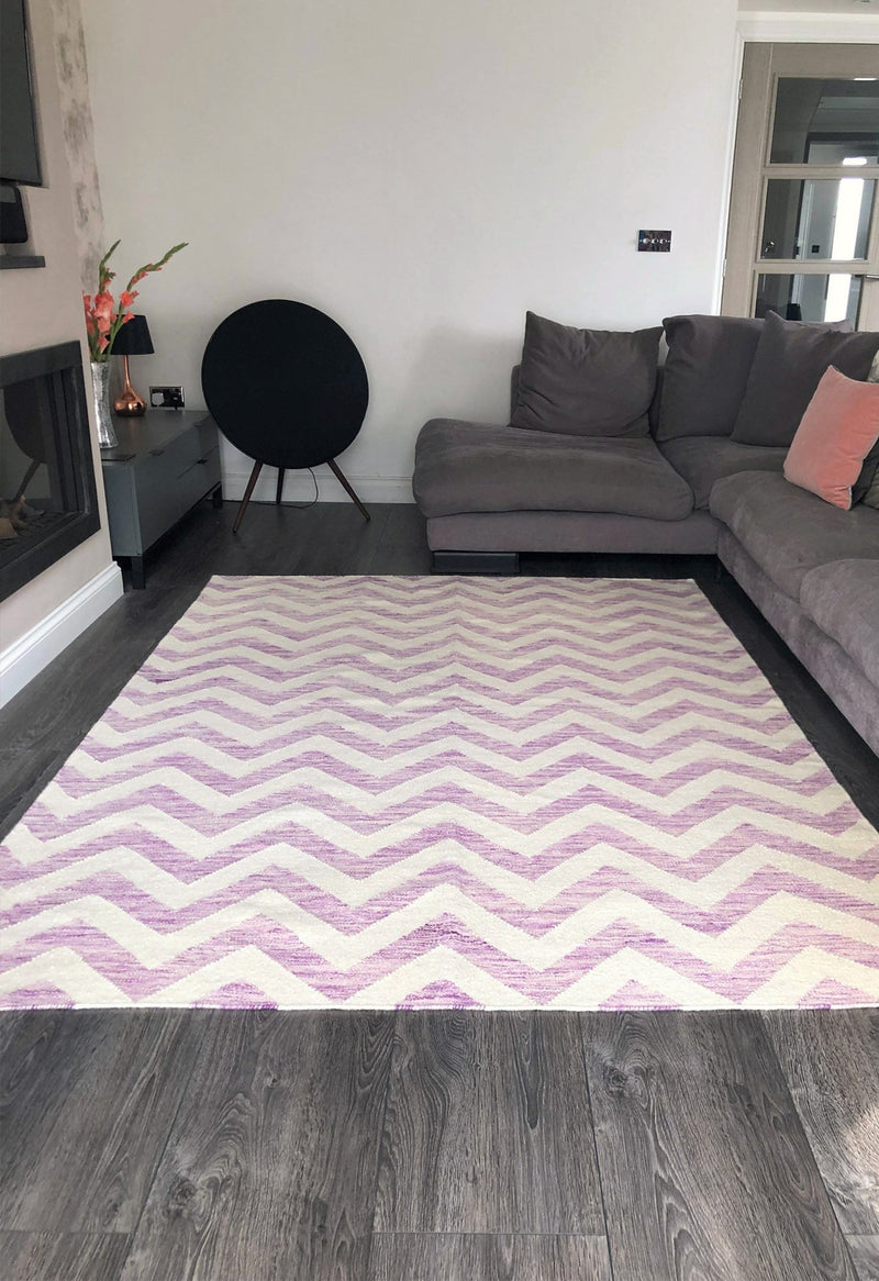 purple zig zag rug in living room