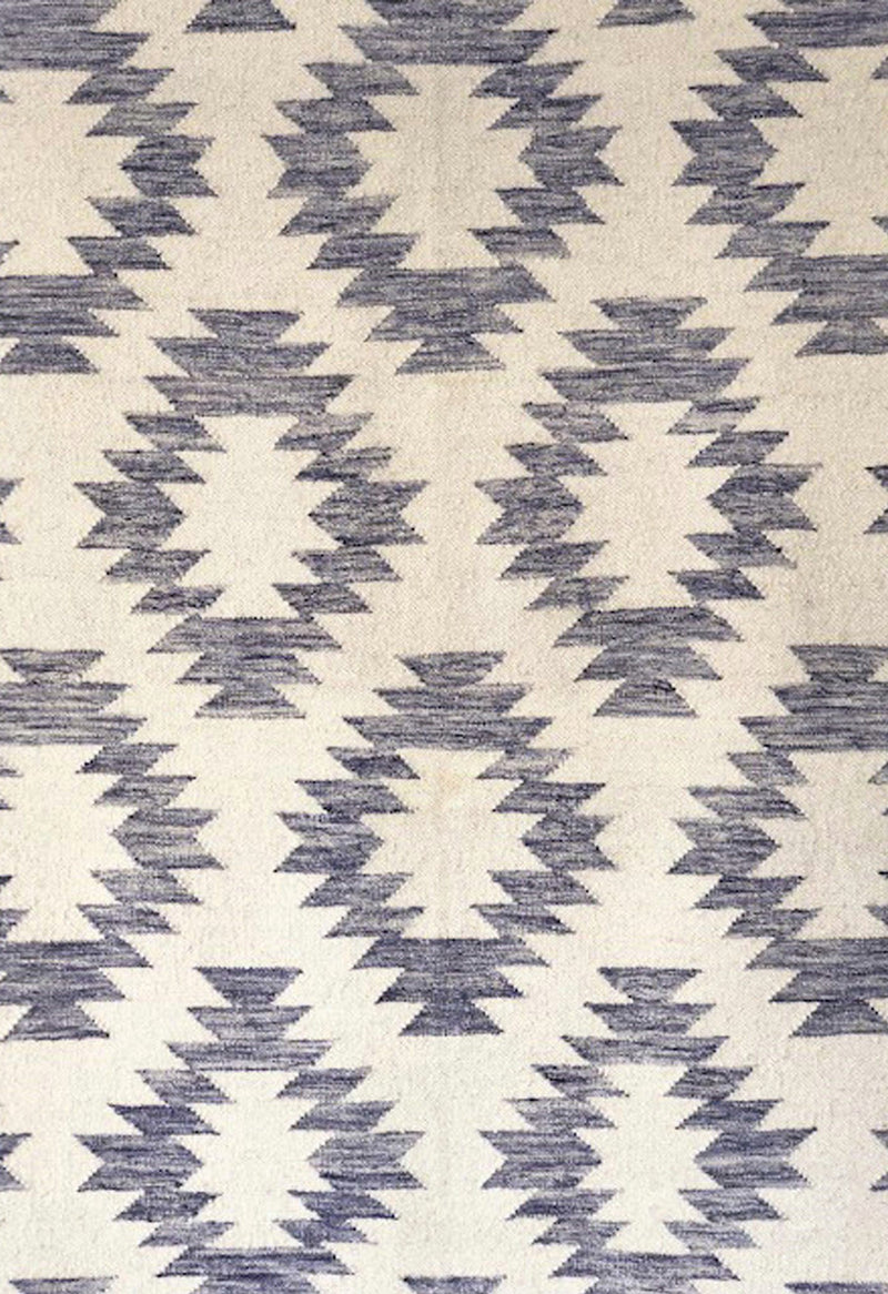 geometric rug with blue pattern