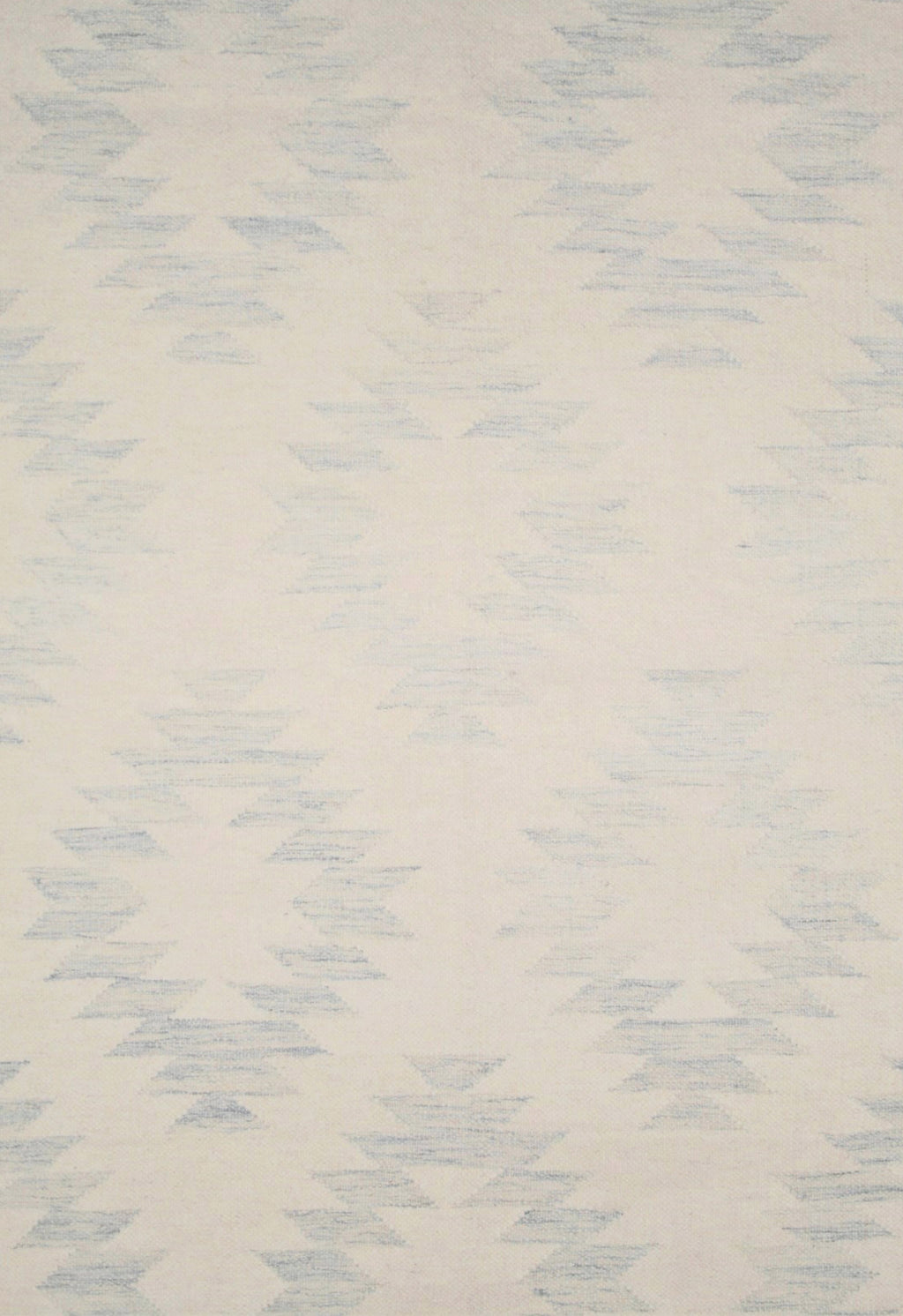 pale blue geometric rug close up
