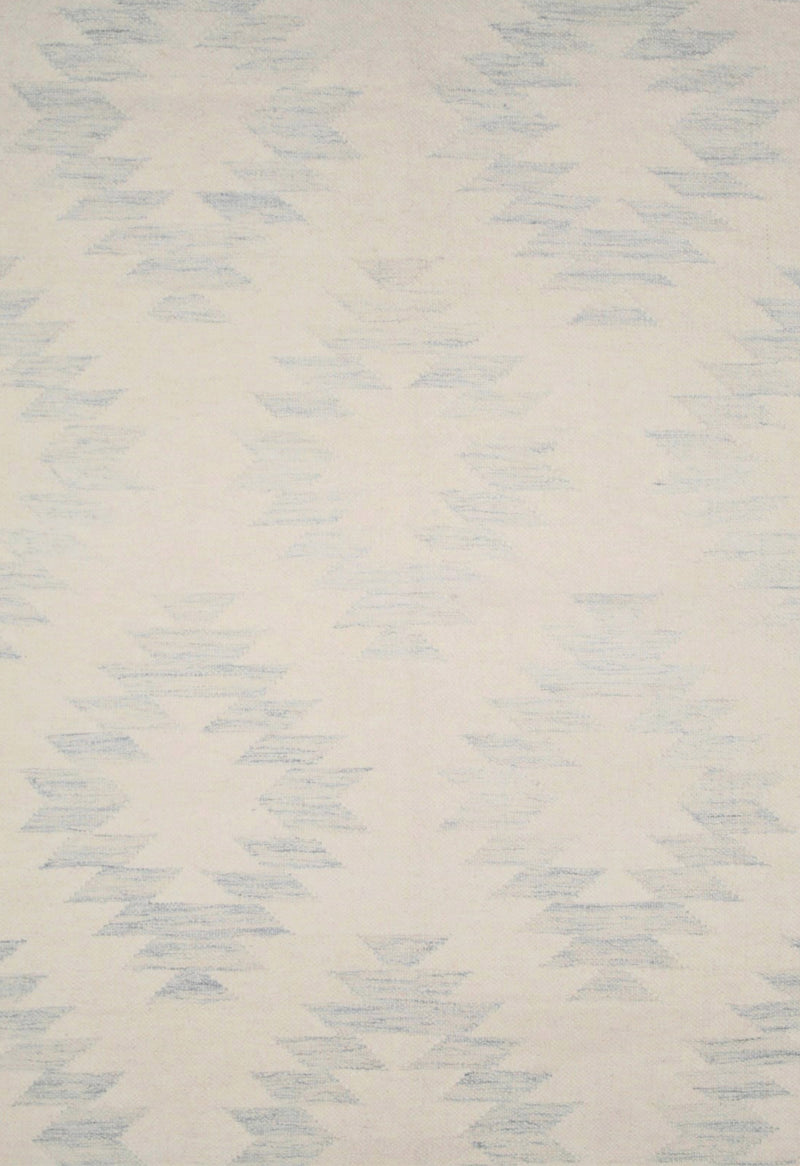 pale blue geometric rug close up