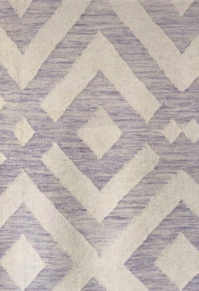 purple geometric rug close up