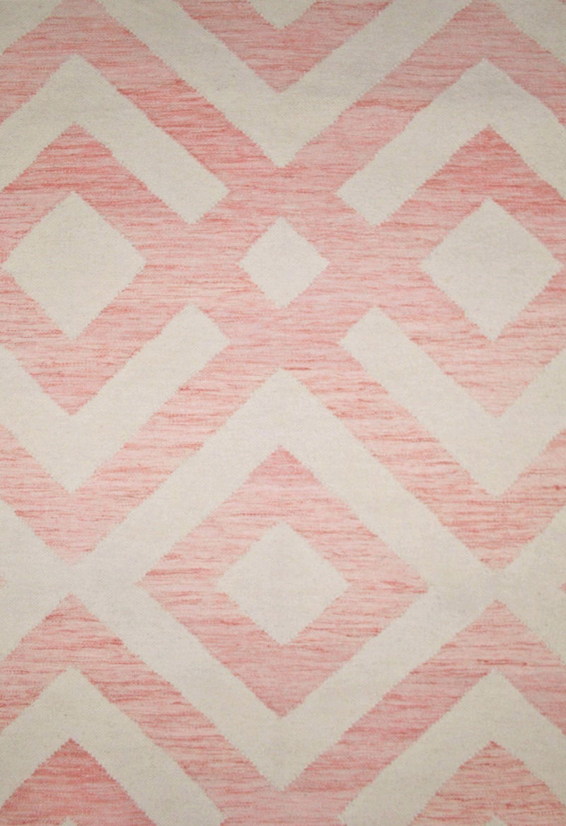 red geometric rug close up