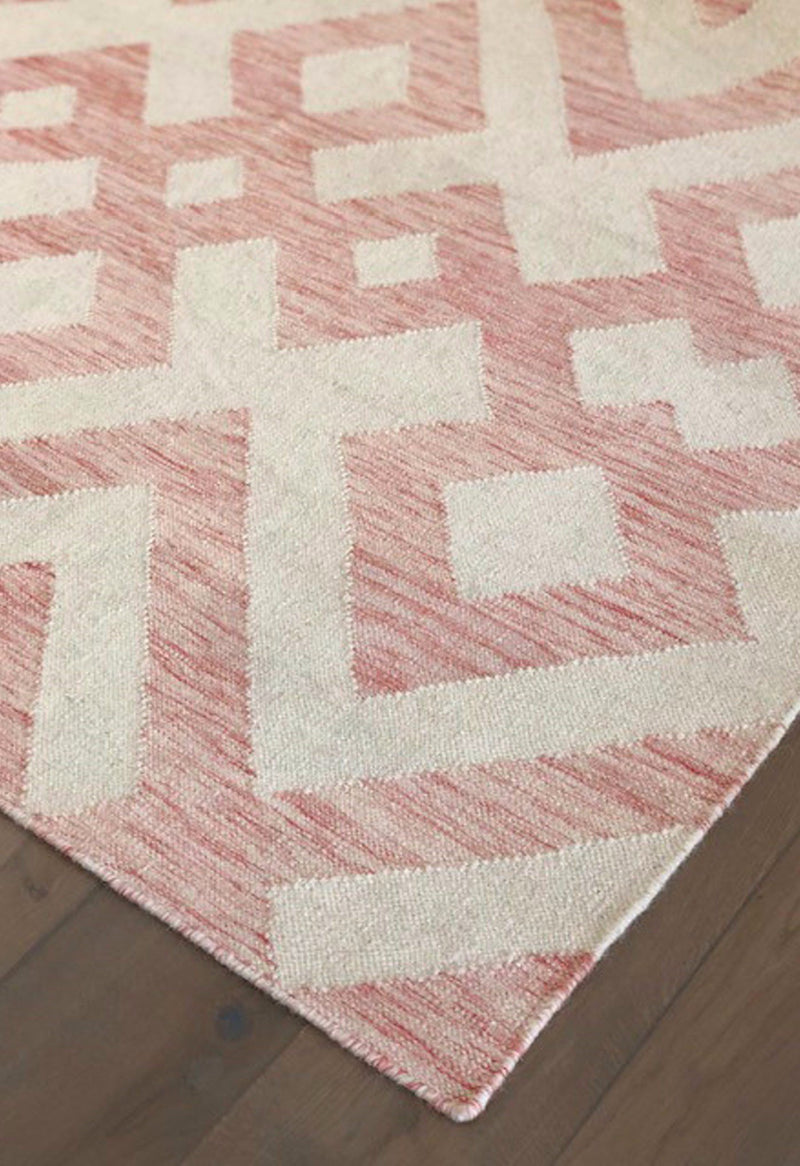 corner of red geometric rug
