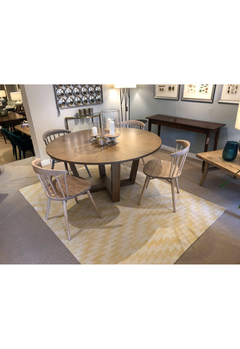 modern yellow rug in dining room