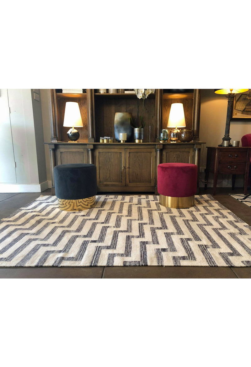 black and white geometric rug in room
